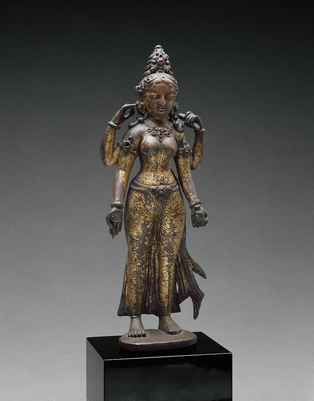 Sarasvati, Goddess of Wisdom, Holding a Book and a Water Pot