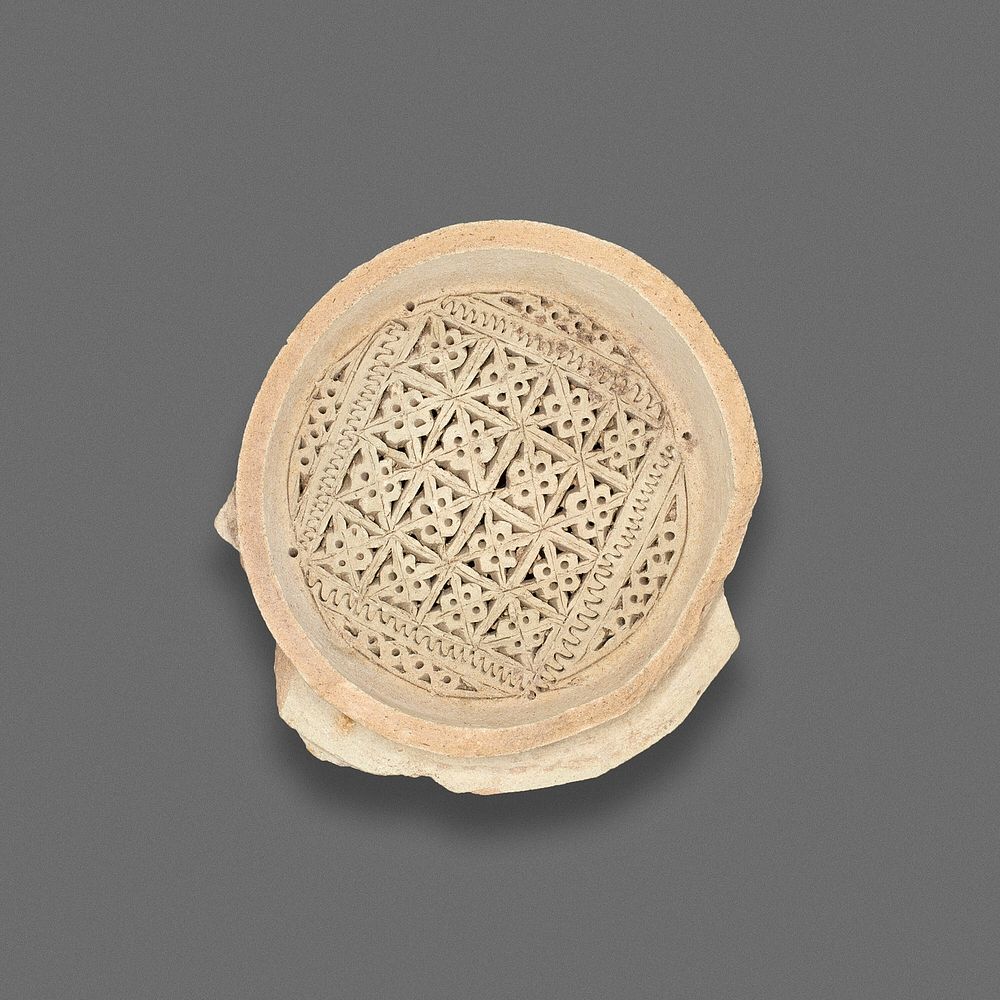 Clay Filter with punched and inscribed decoration by Islamic