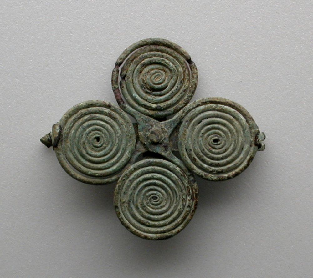 Quatrefoil spiral fibula (garment pin) by Ancient Etruscan