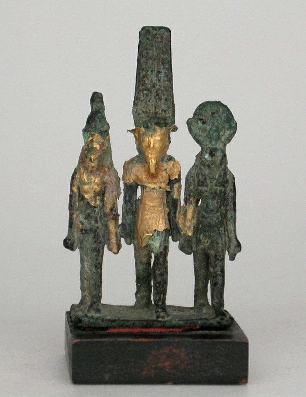 Statuette of the Theban Triad, Amun, Mut, and Khonsu by Ancient Egyptian
