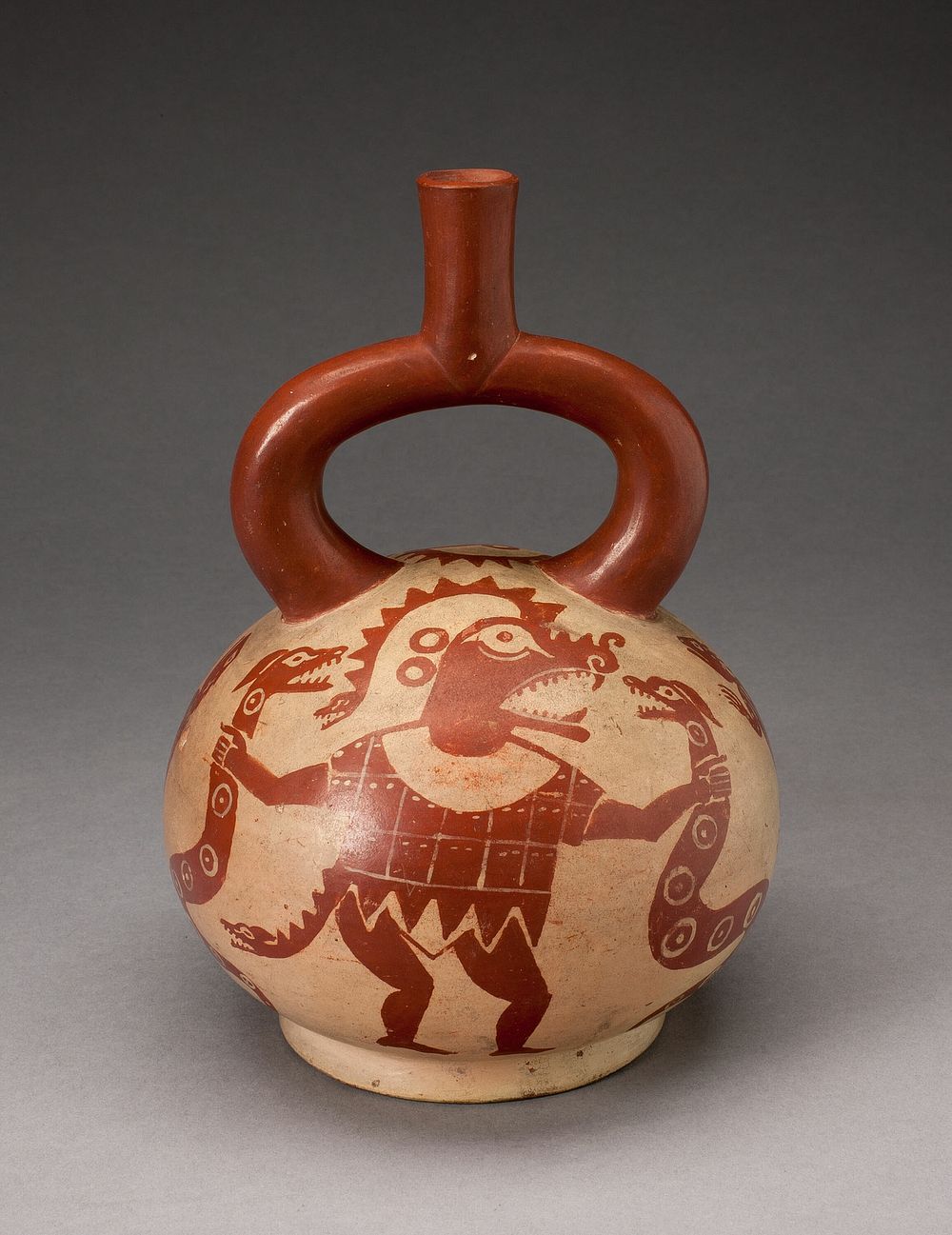 Ritual Vessel Depicting a Masked Deity with Serpents by Moche
