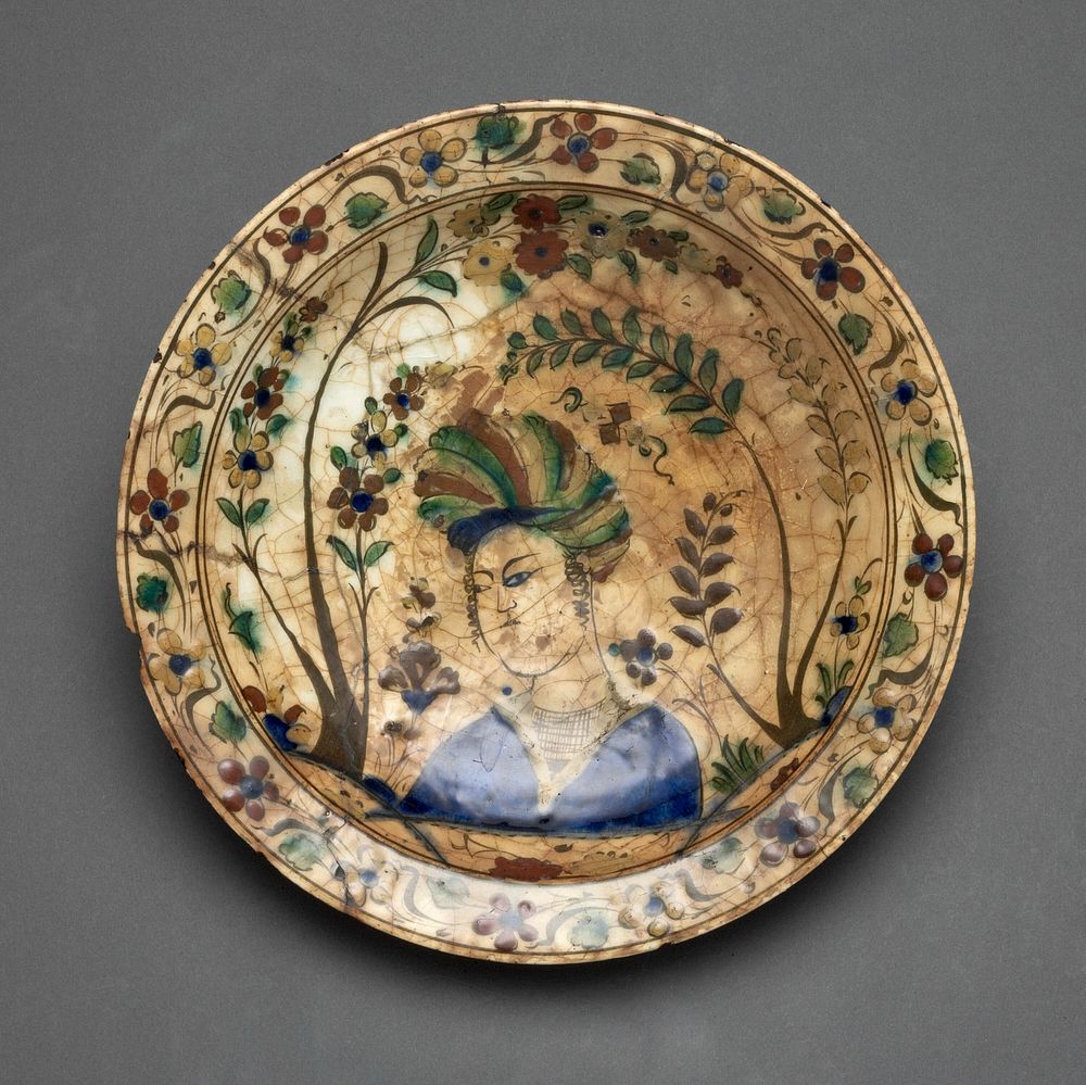 Plate with Courtly Figure and Flowering Plants by Islamic