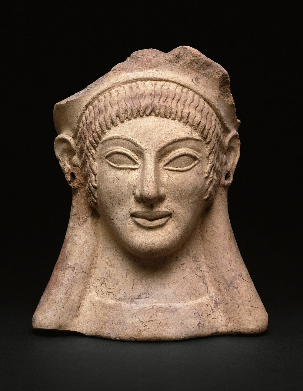 Votive (Gift) in the Shape of a Woman's Head by Ancient Etruscan