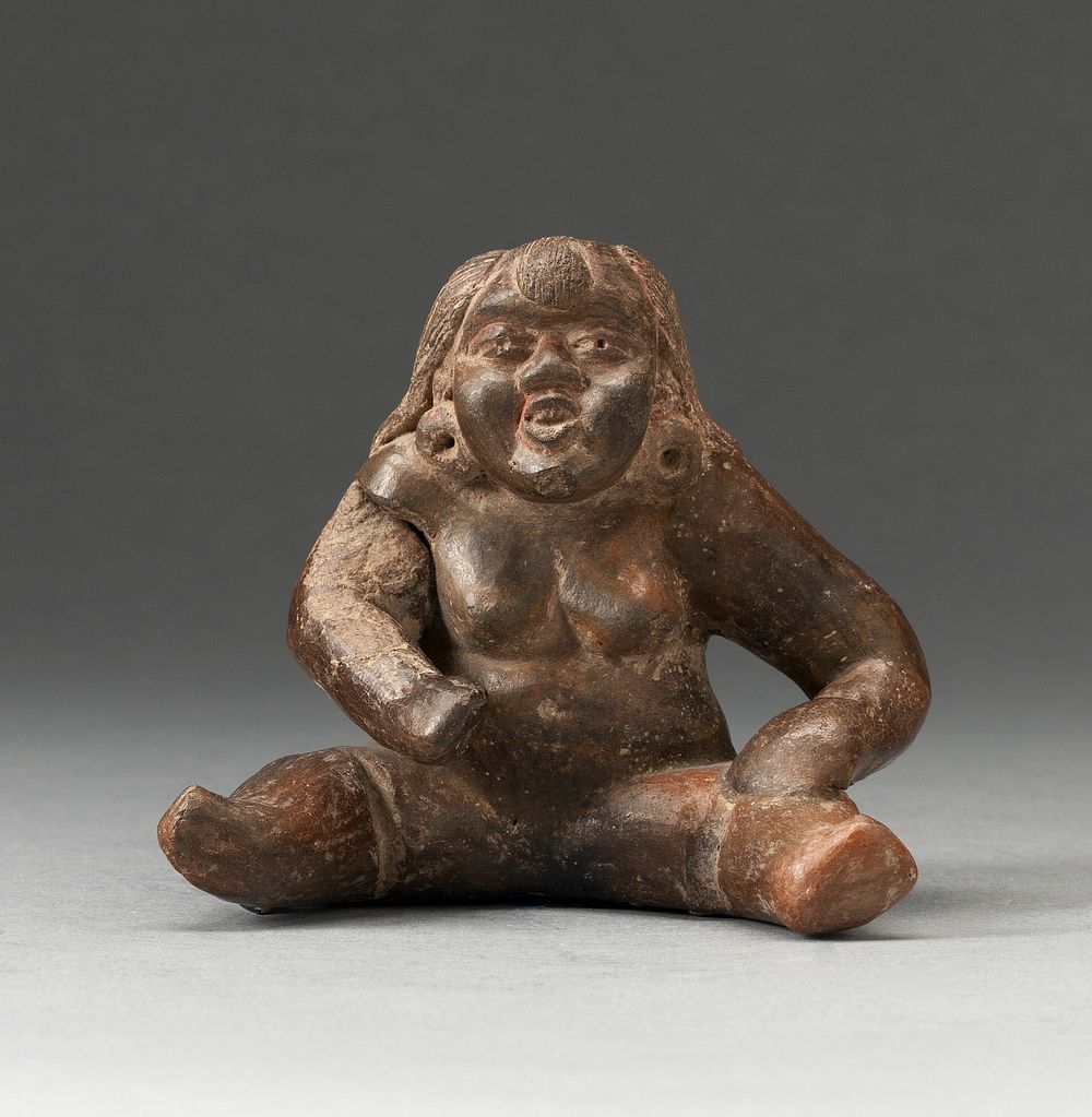 Seated Female Figure by Olmec