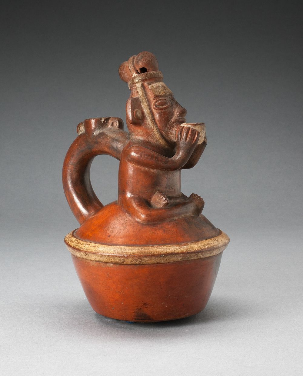 Handle Spout Vessel Depicting Seated Figure Drinking from Cup by Chimú