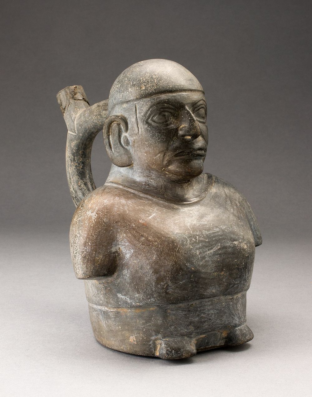Portrait Vessel of Man with Arms that End at Elbows by Moche