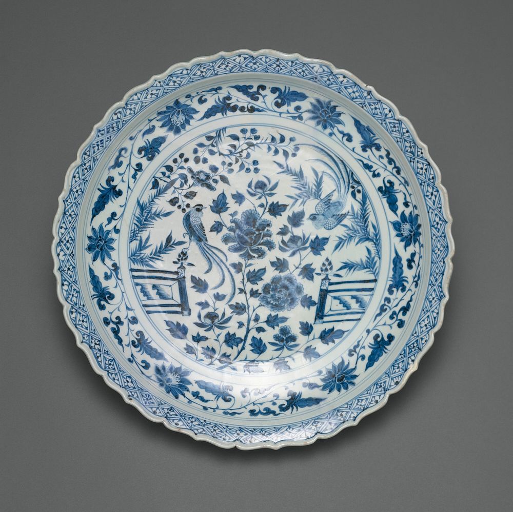 Shallow Dish with Long-Tailed Birds in a Garden of Stylized Peonies and Fronds, Encircled by a Scrolling Wreath of Camellia…