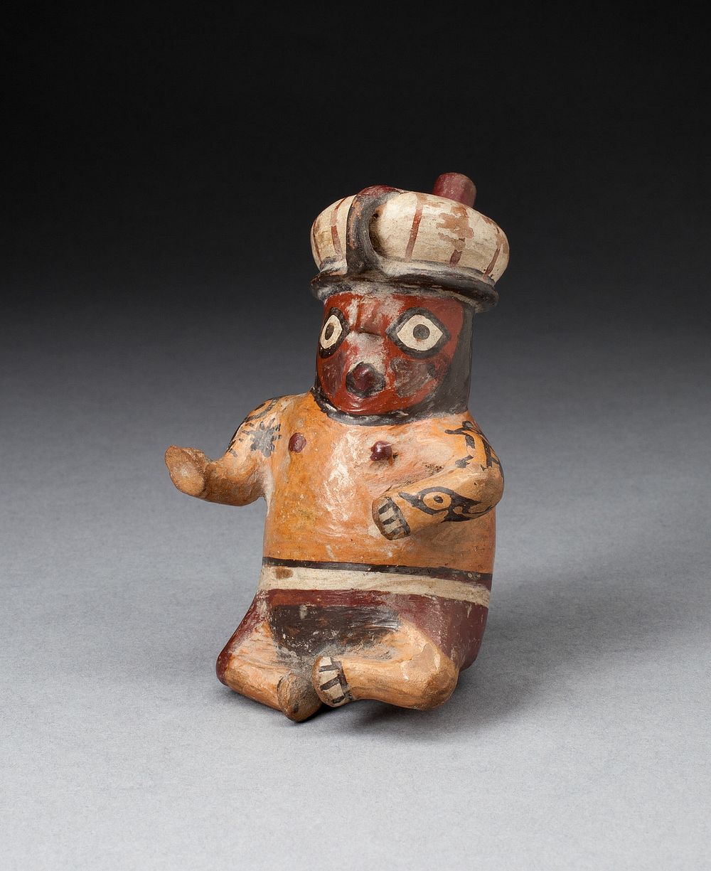 Miniature Spouted Jar in the Shape of a Seated Figure by Nazca