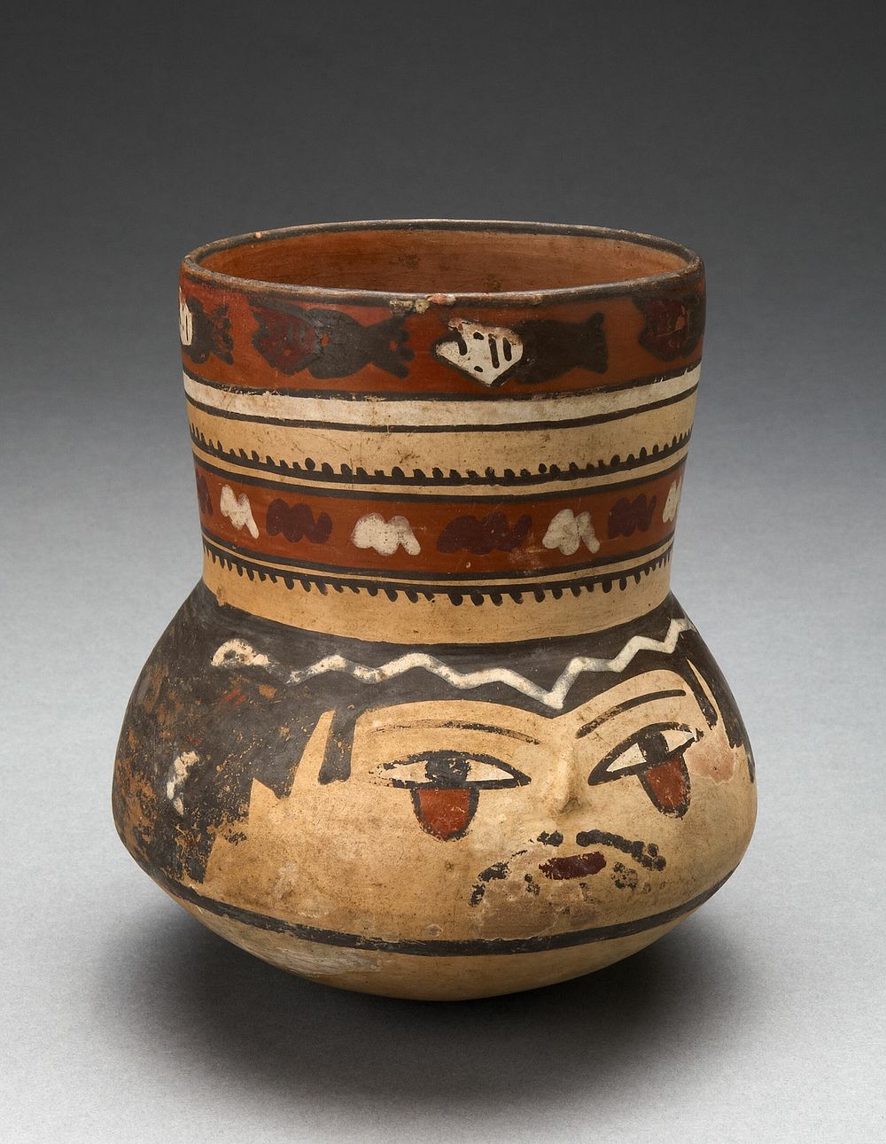 Beaker Depicting Human Head and Rows of Geometric Motifs by Nazca