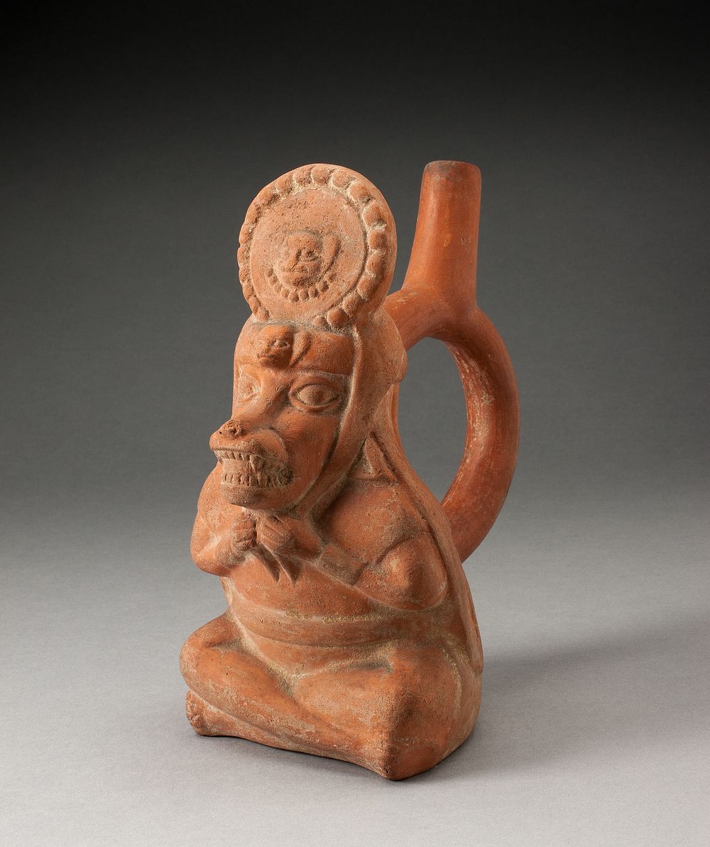 Handle Spout Vessel in Form of a Royal Messenger with the Head of a Fox by Moche