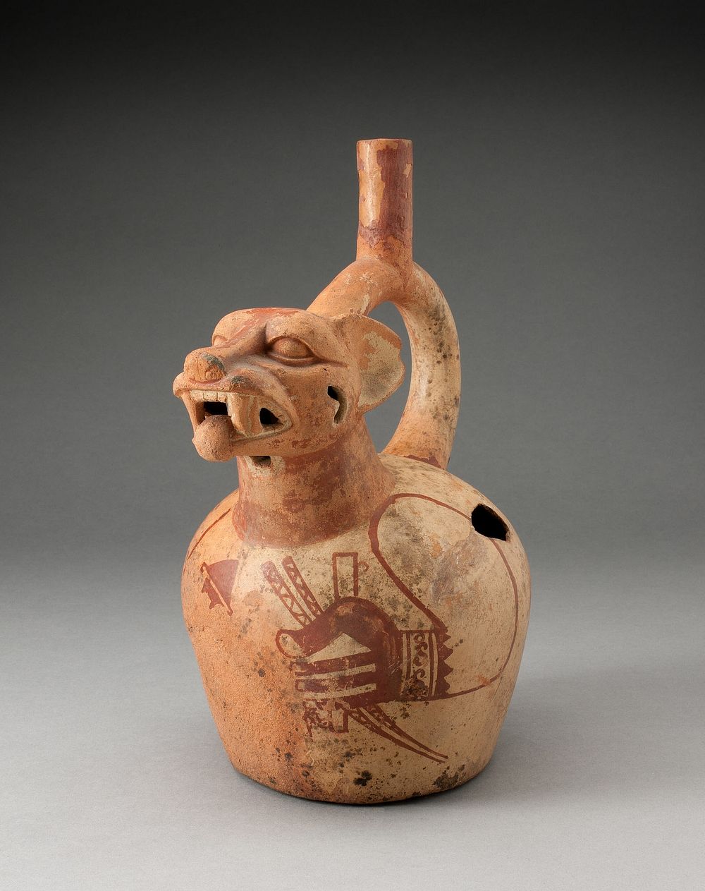 Handle Spout Vessel in the Form of a Fox Warrior by Moche