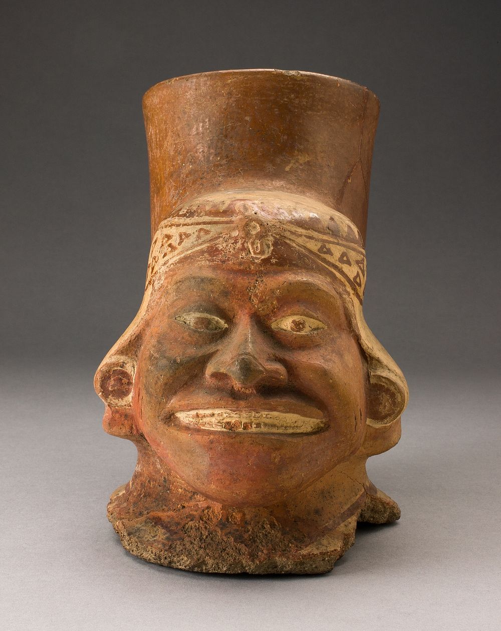 Fragment of a Jar In the Form of a Human Head with a Wrapped-Textile Headdress by Moche