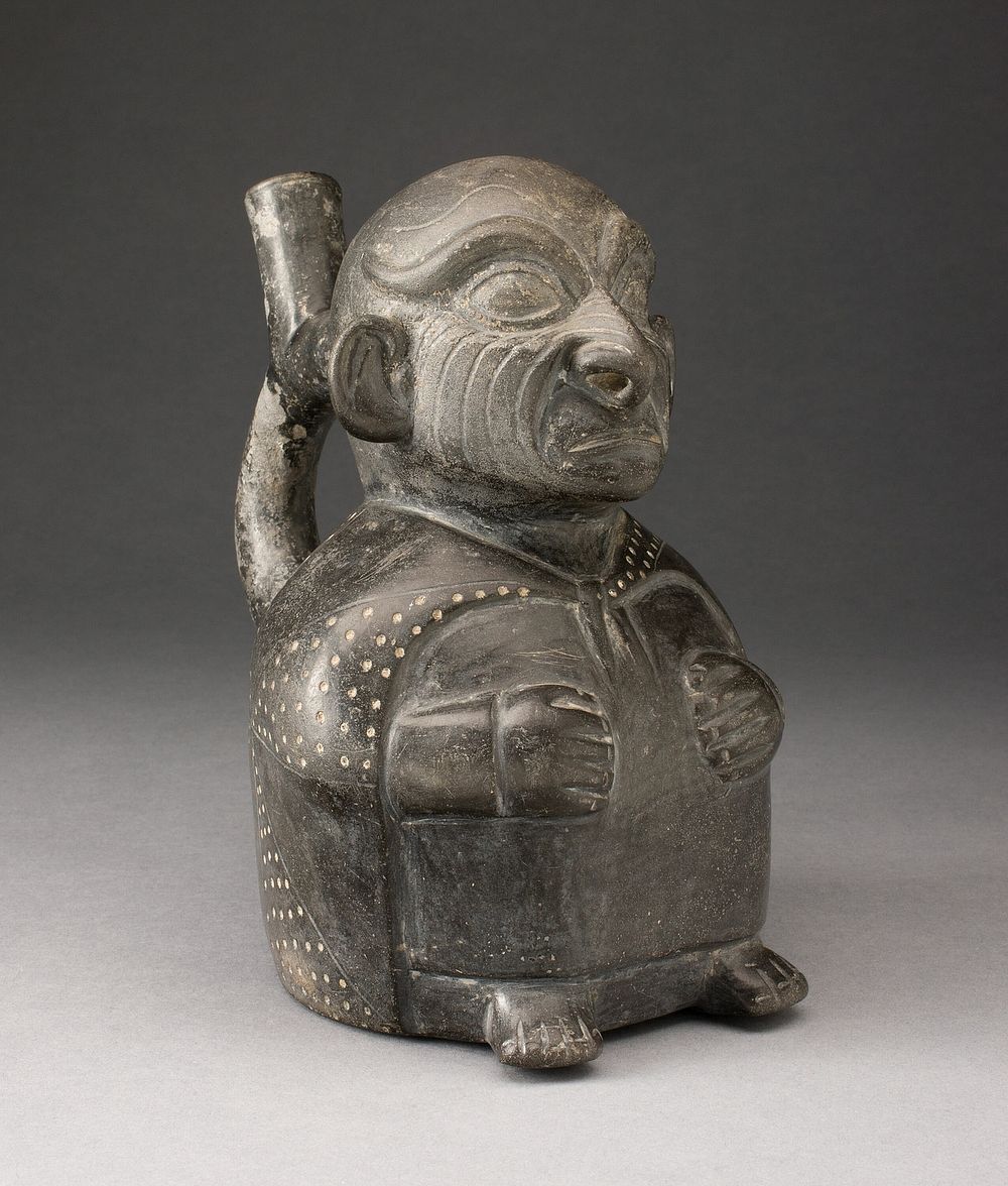 Portrait Vessel of Seated Figure with Wrinkled Face by Moche