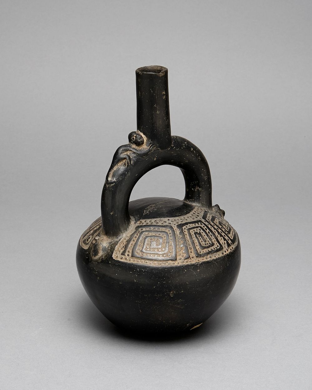 Blackware Stirrup Spout Vessel with Incised Squared Spiral Motif by Chimú