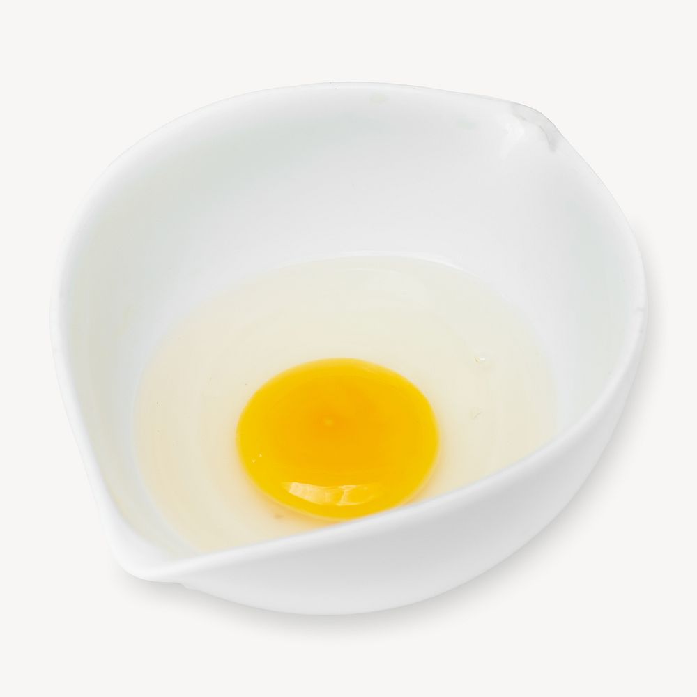 Fresh egg yolk in white bowl