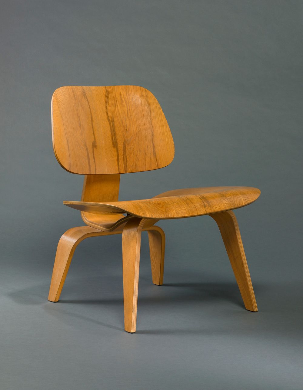 Herman Miller's Lounge Chair Wood (LCW) designed by Charles Eames and Ray Kaiser Eames 