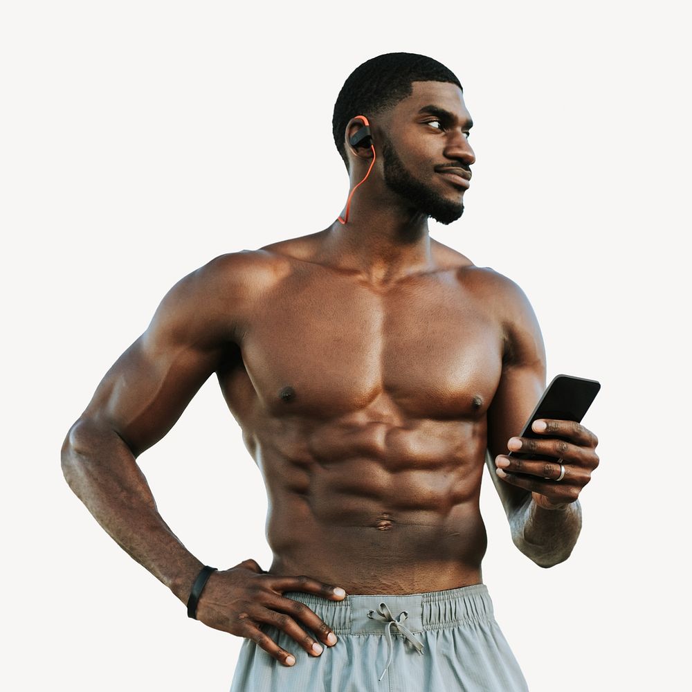 Fit man listening to music isolated image