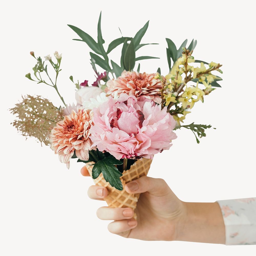 Woman holding flowers in ice cream cone