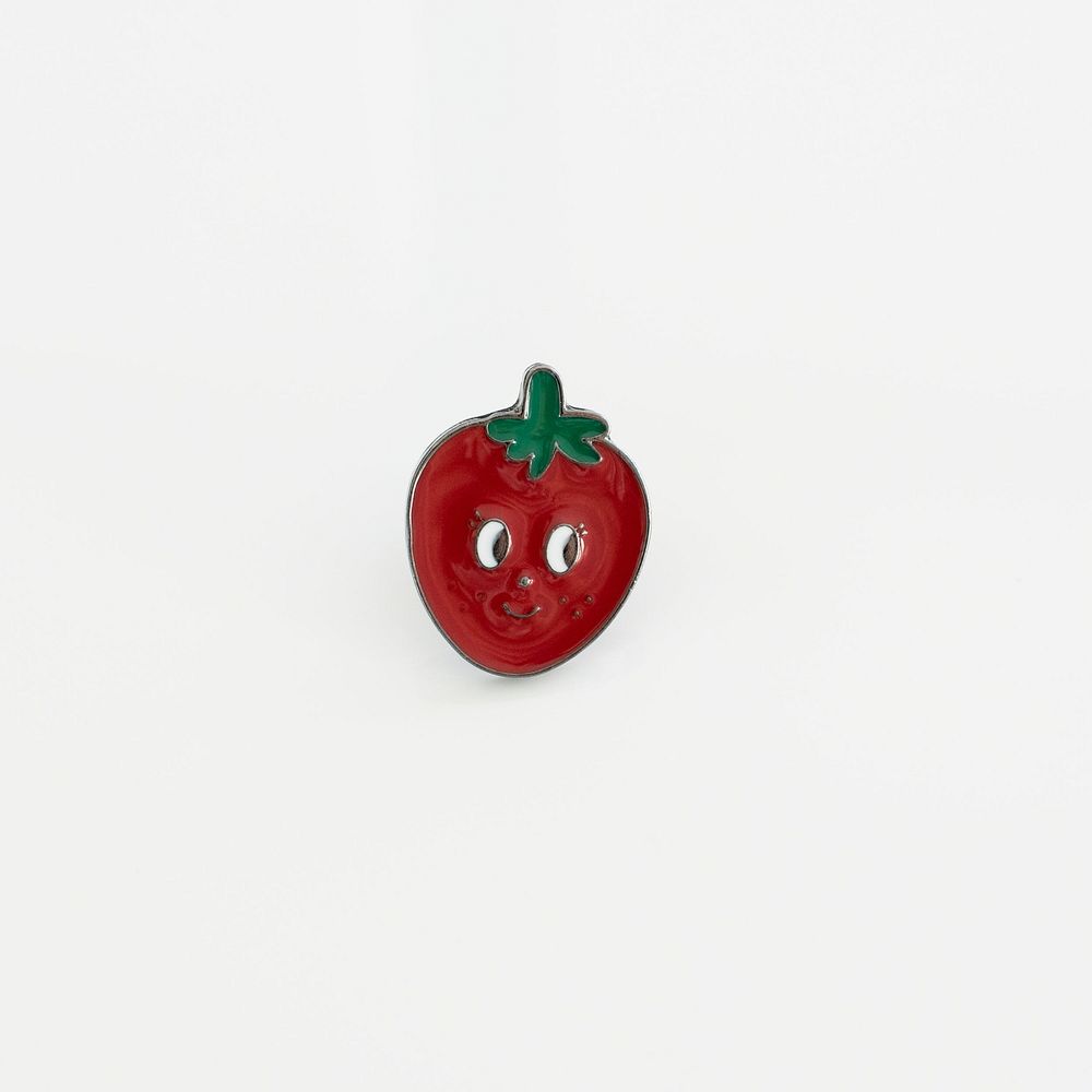Strawberry soft enamel pin product photo.