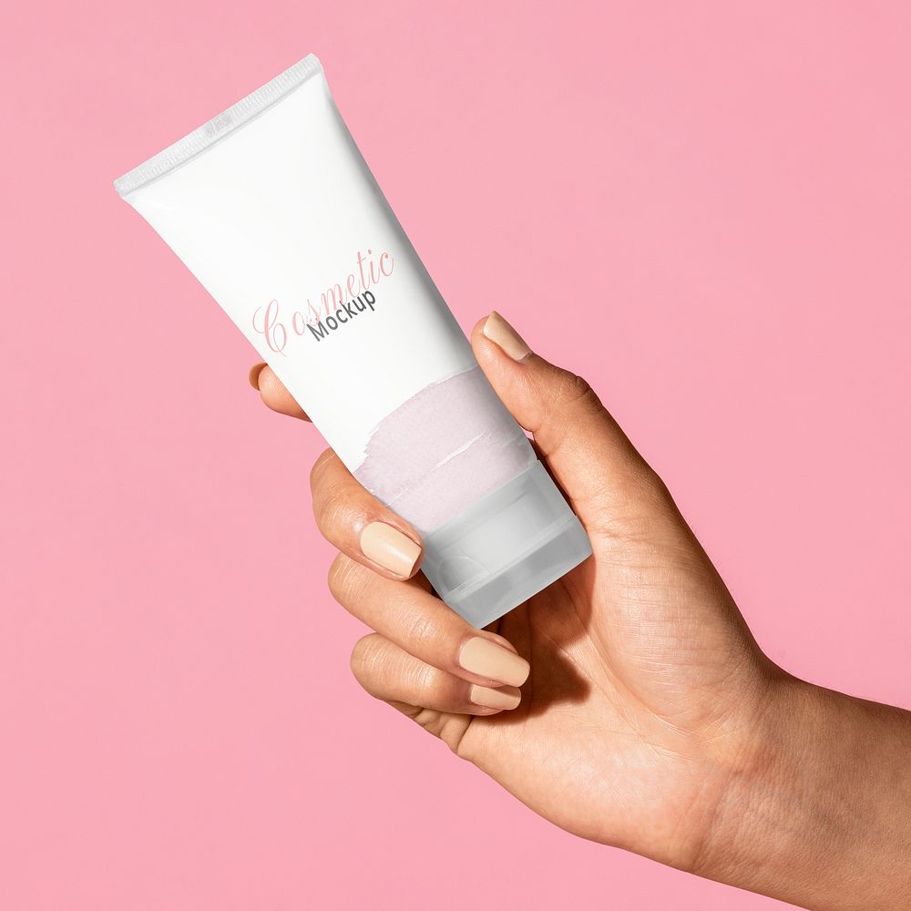 Woman holding a skin care product mockup