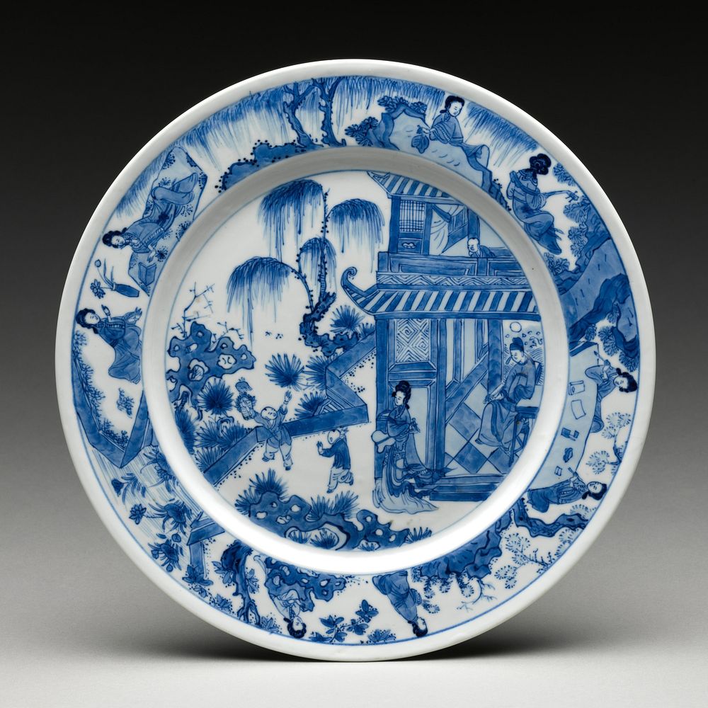 Dish with scene of a family