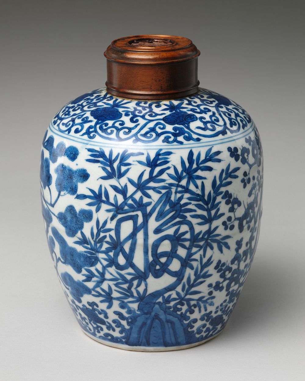 Jar decorated with auspicious characters amid plants