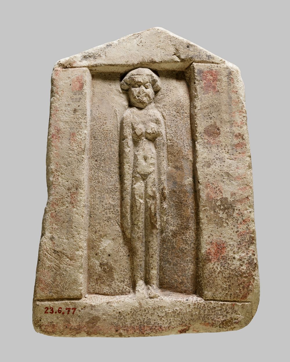 Plaque with nude female in a shrine niche