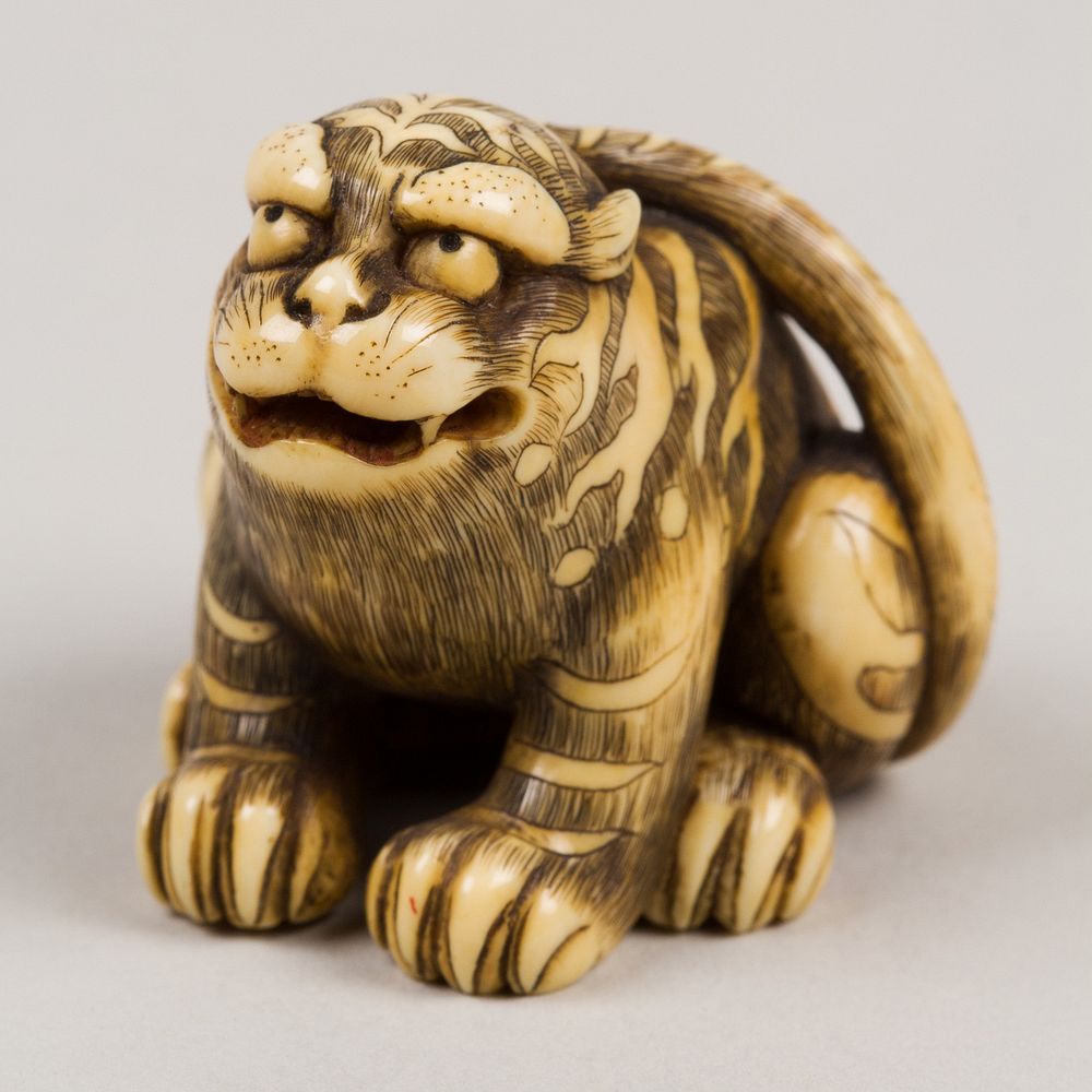Netsuke of Seated Tiger, Tail Resting on his Back;