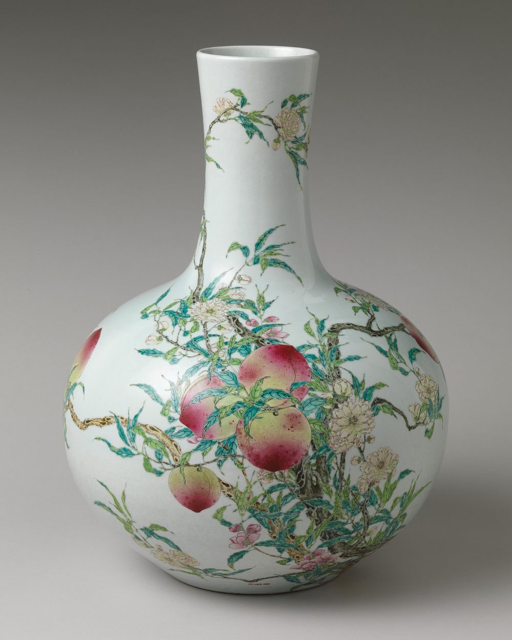 Vase with nine peaches