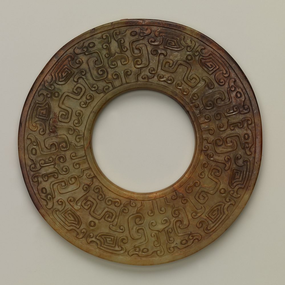 Annular Disk with Carved Designs