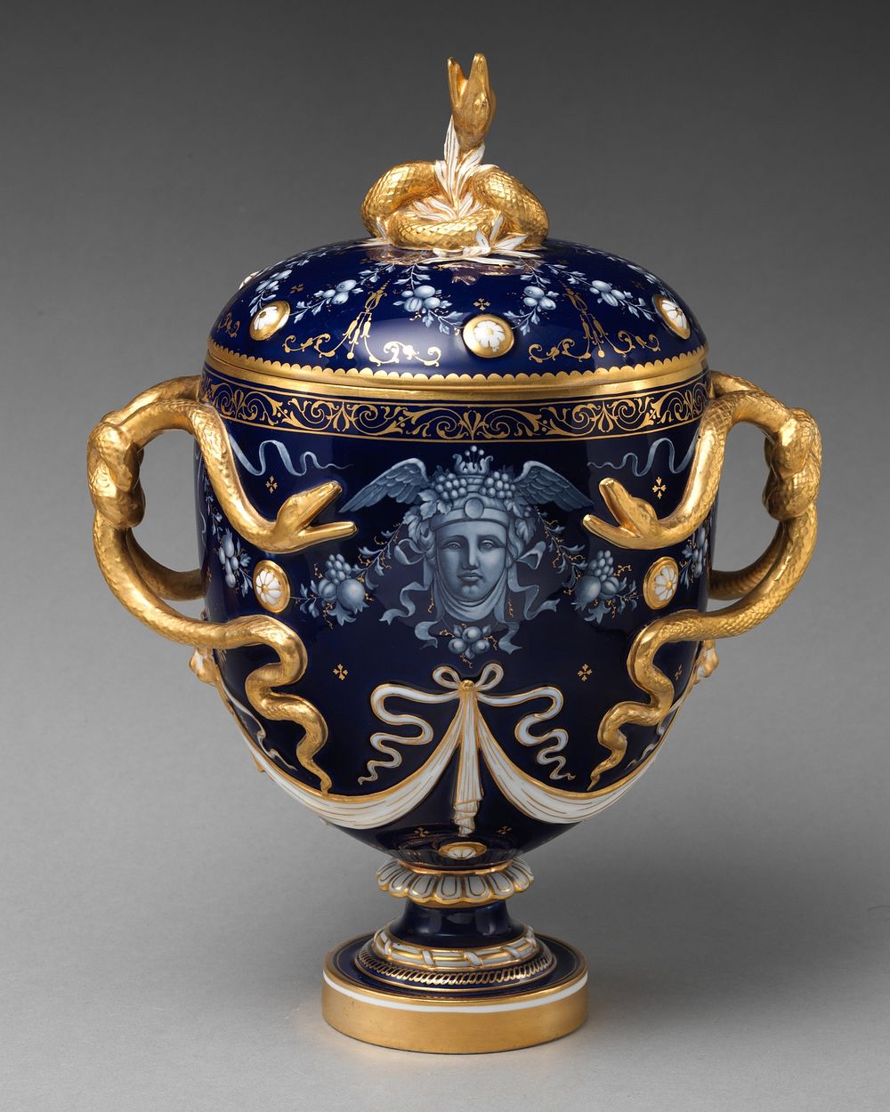 Lidded vase with Medusa decoration and snake handles