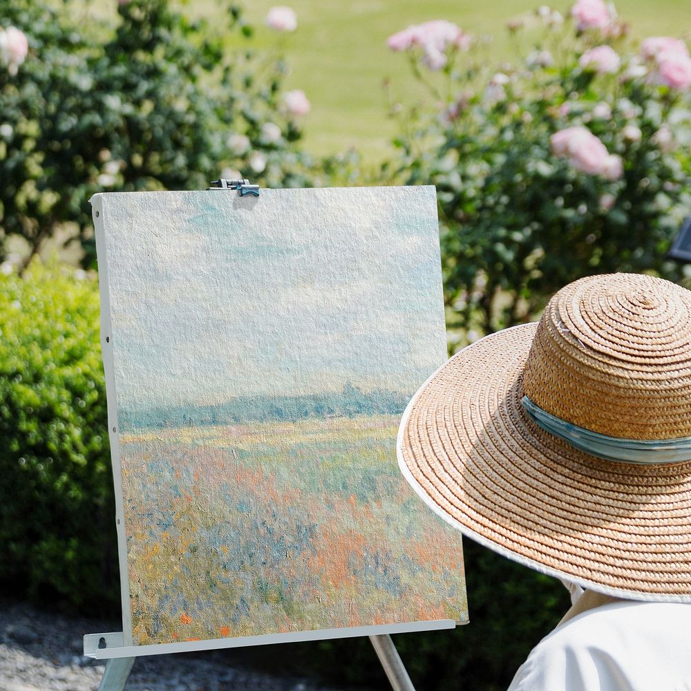 Artist painting flower field