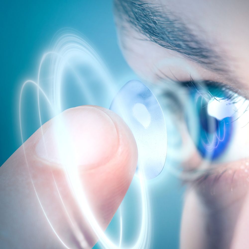 Man applying smart contact lens, biometric technology