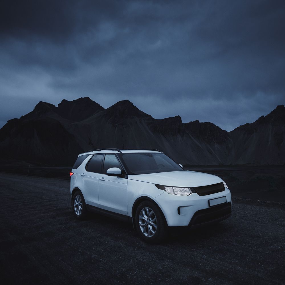 White SUV car at night