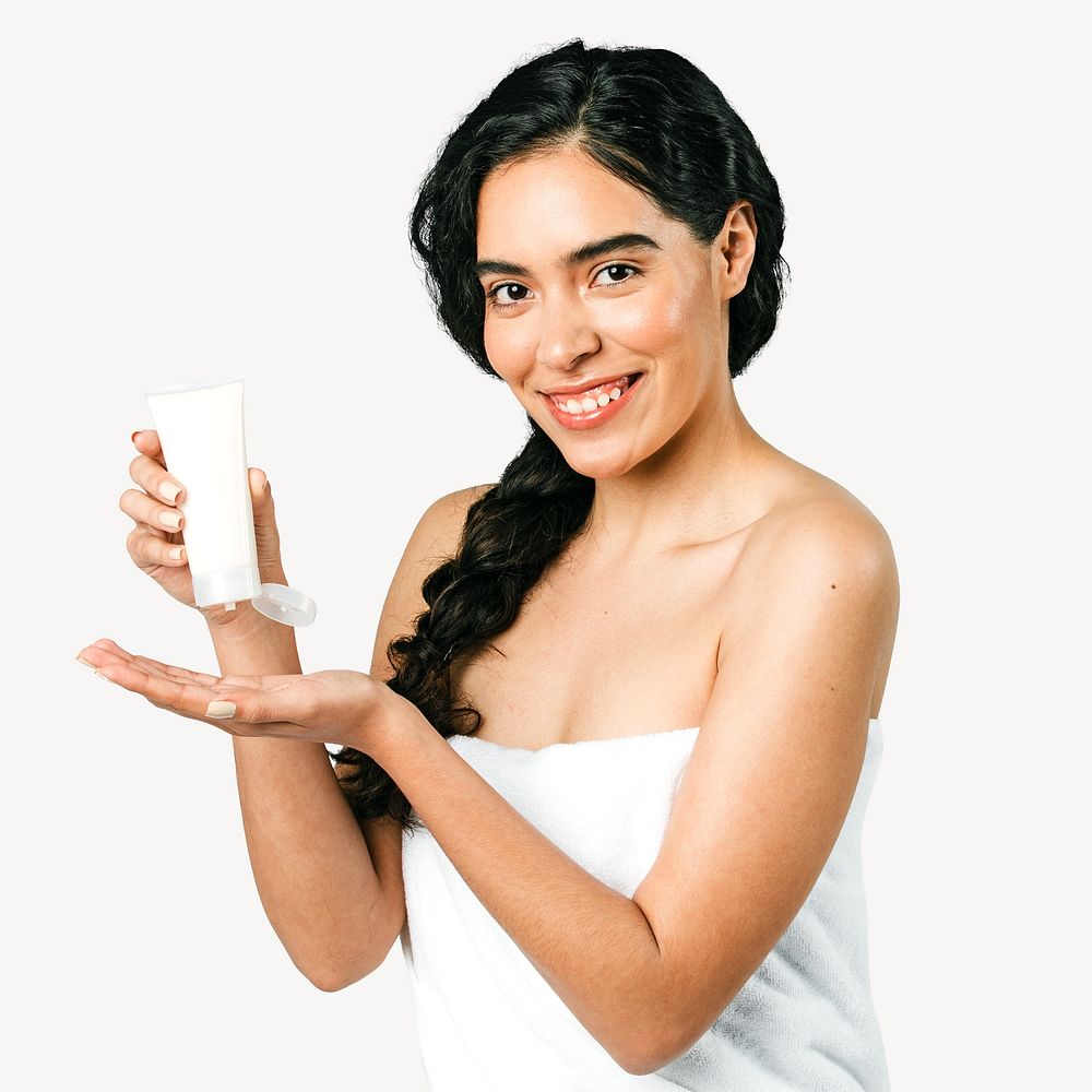 Beautiful woman holding a skin care product isolated image