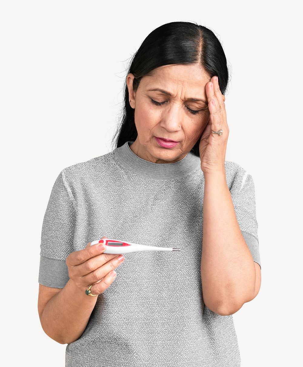 Indian woman headache measuring her temperature with electric thermometer image element