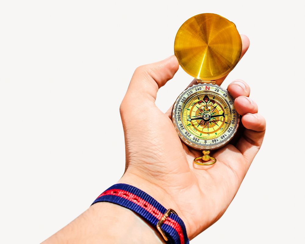 Hand holding compass isolated image