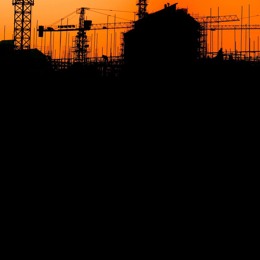 Construction silhouette, orange background