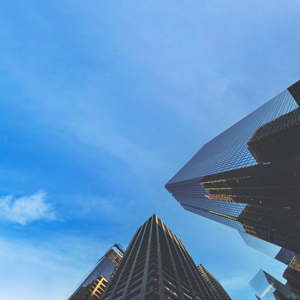 Low-angle building border background, blue sky image