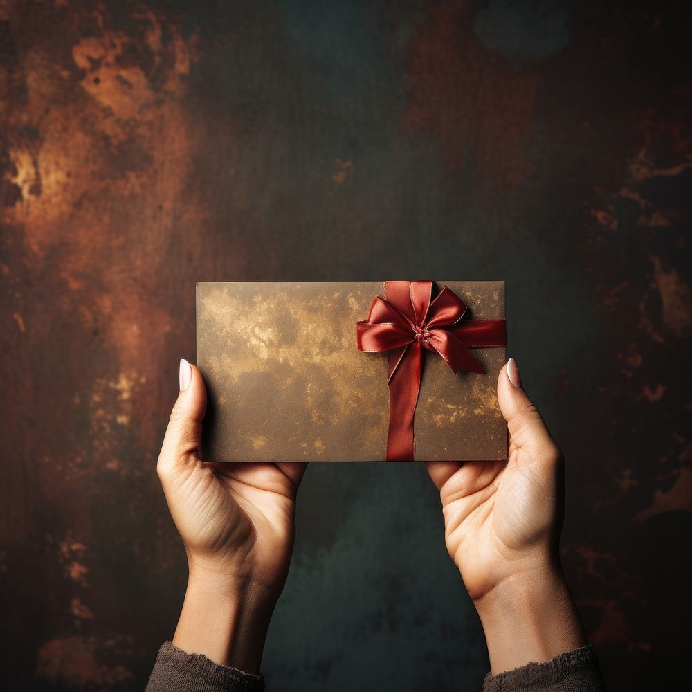 Paper holding gift hand. AI generated Image by rawpixel.