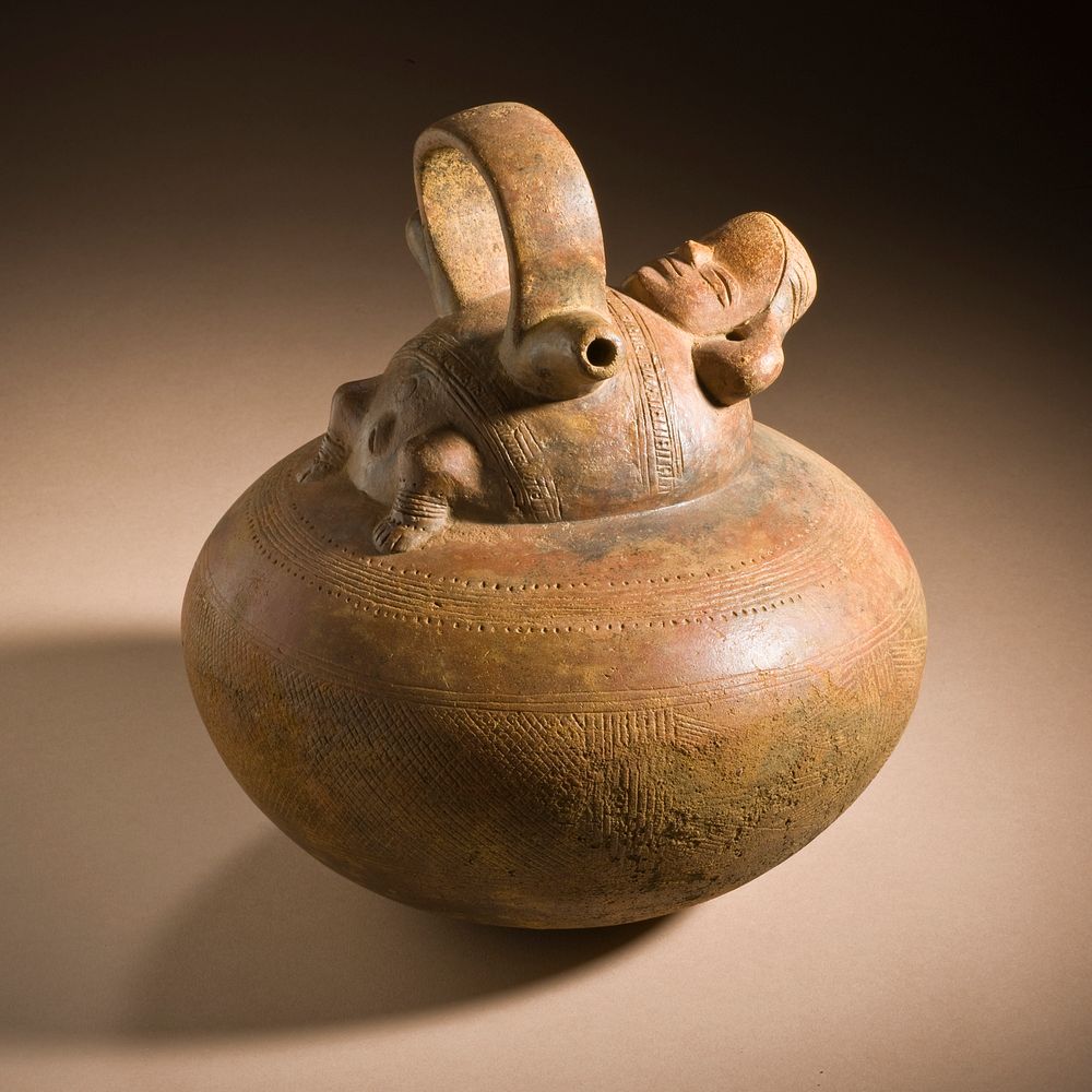 Double Spout and Bridge Vessel with Reclining Female Figure