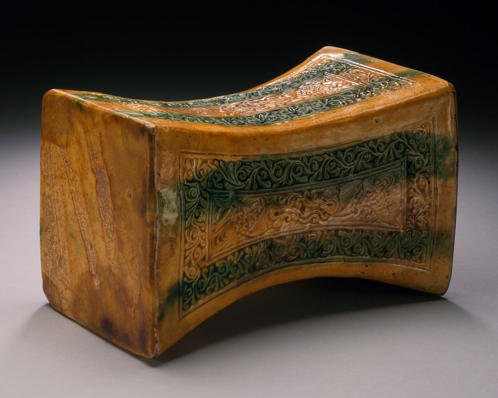 Funerary Headrest (Zhen) with Confronting Flying Fish and Floral Scrolls