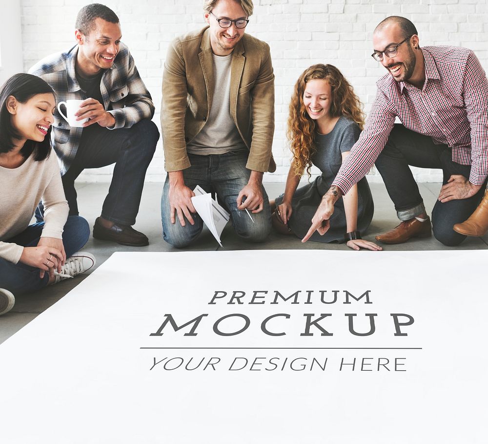 Diverse team discussing a poster mockup