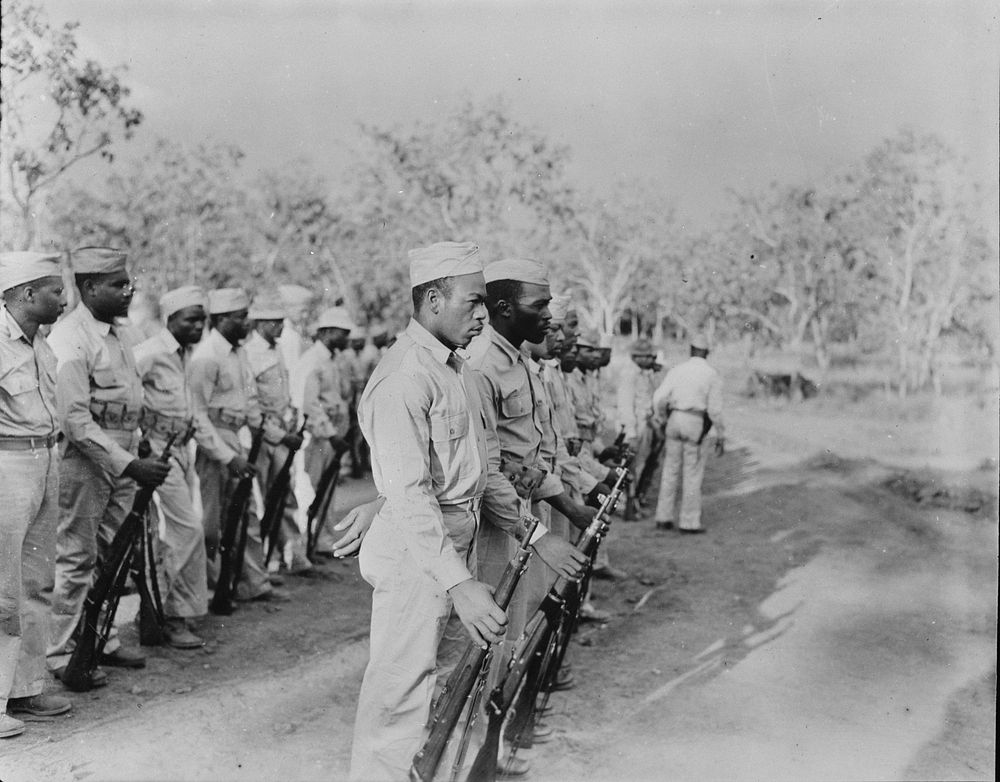 U.S. African American troops in New Guinea. "Parade rest" command is given to soldiers holding "retreat" formation in New…