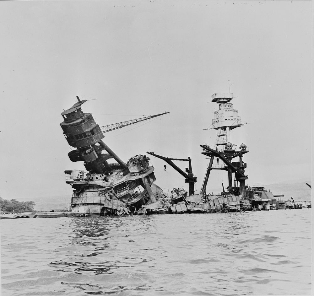 USS Arizona, at height of fire, following Japanese aerial attack on Pearl Harbor, Hawaii. Sourced from the Library of…
