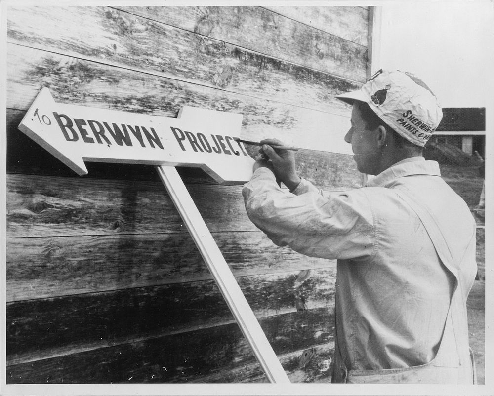Carpenter or painter at work on the Berwyn project, Maryland. Sourced from the Library of Congress.