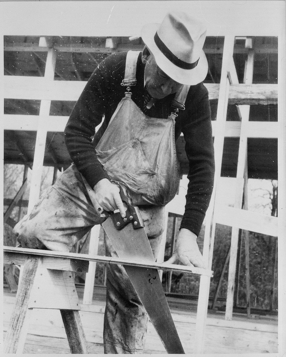 Carpenter at the Berwyn project, Maryland. Sourced from the Library of Congress.