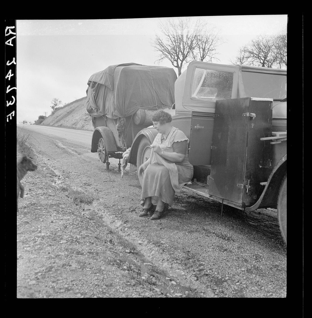 Migrant pea workers on the road. All their worldly possessions in car and trailer. California. Sourced from the Library of…