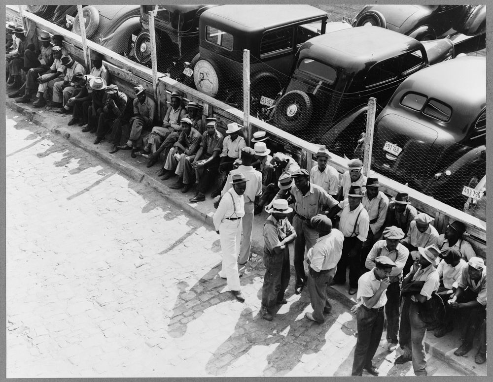 Part of the daily lineup outside the State Employment Service Office. Memphis, Tennessee. Sourced from the Library of…