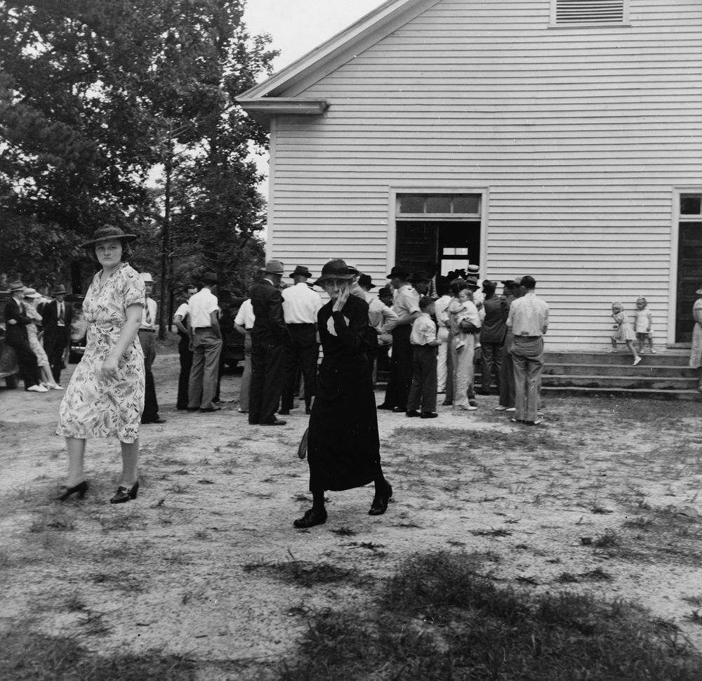 Members of congregation leaving for home after services. Wheeley's Church, Person County, North Carolina. Sourced from the…